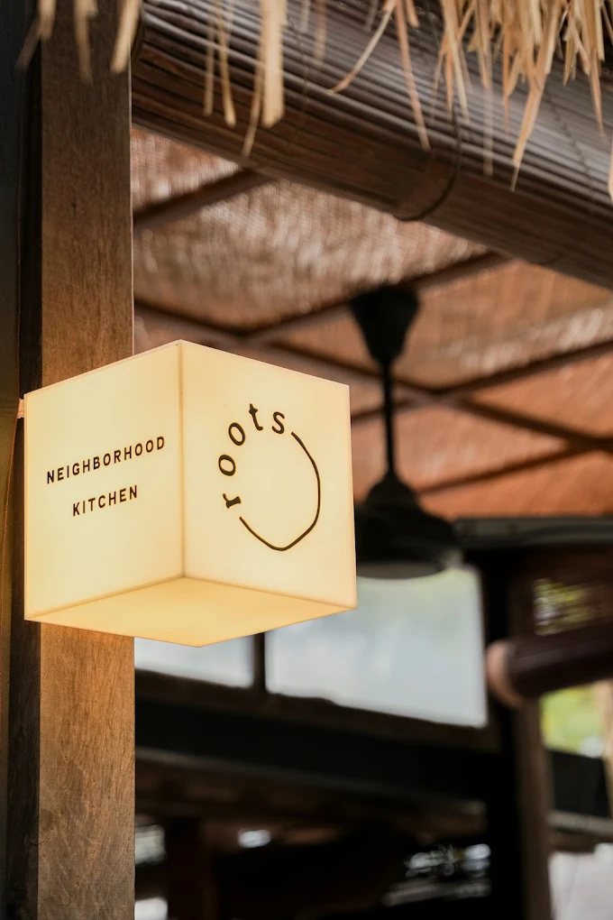 Roots signage — Neighborhood Kitchen